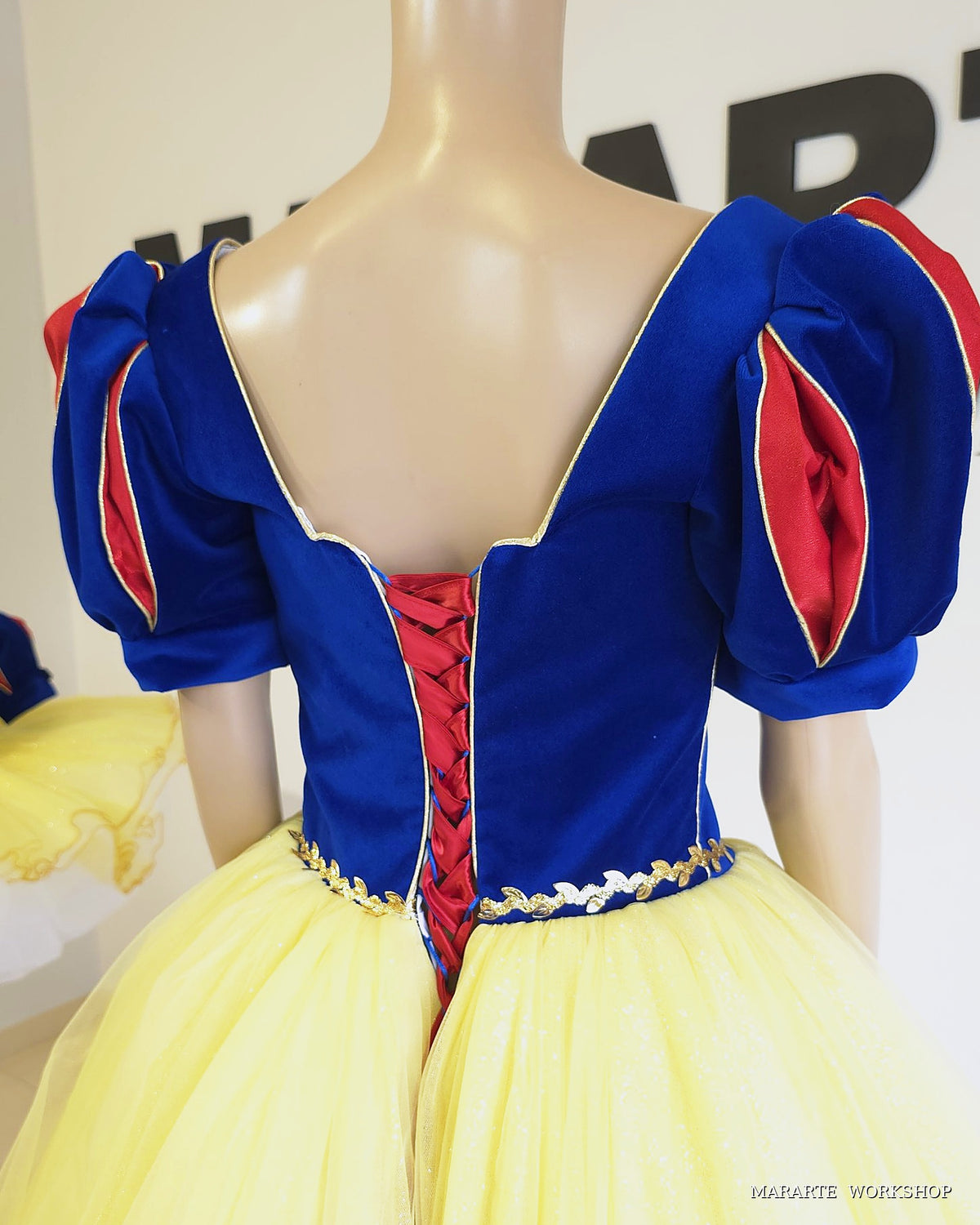 Back view of women's Snow White inspired dress with red satin corset lace-up back - Mararte Workshop