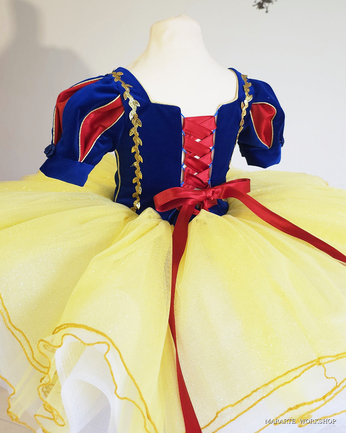 Back view of Snow White inspired tutu dress with red satin corset lace-up back and bow - Mararte Workshop