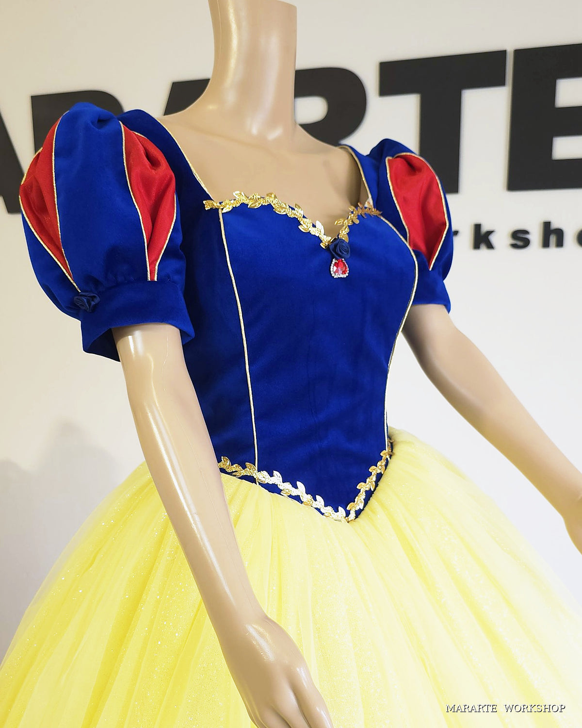 Side view of women's Snow White inspired princess dress with velvet puff sleeves and red satin slashed inserts - Mararte Workshop