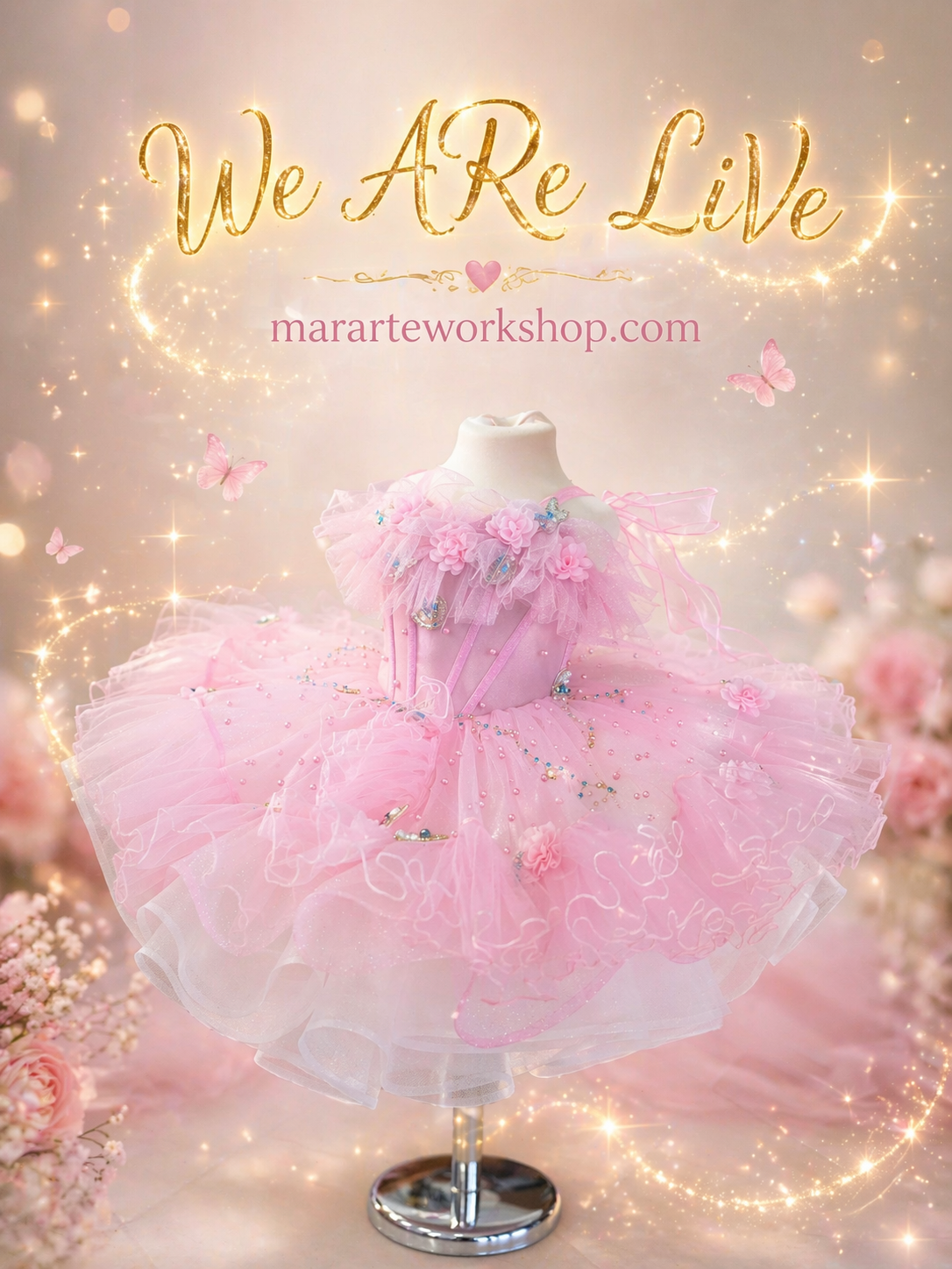 Pink children's dress on a mannequin with sparkling background and 'We ARE LiVe' text.